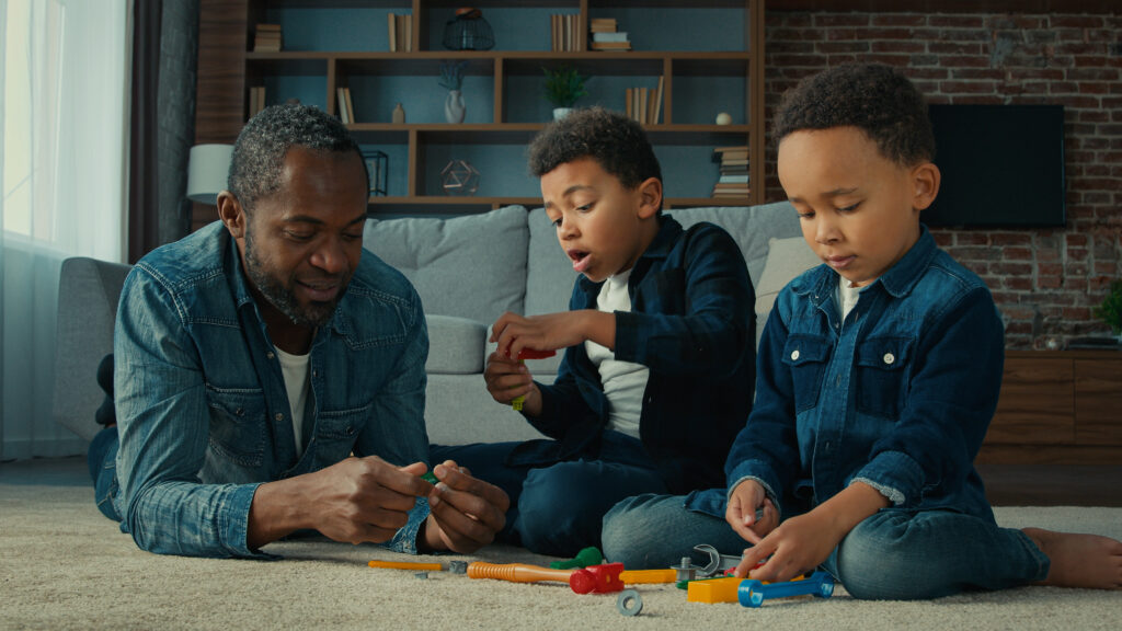 A father enjoying life after Ironman by playing with his children
